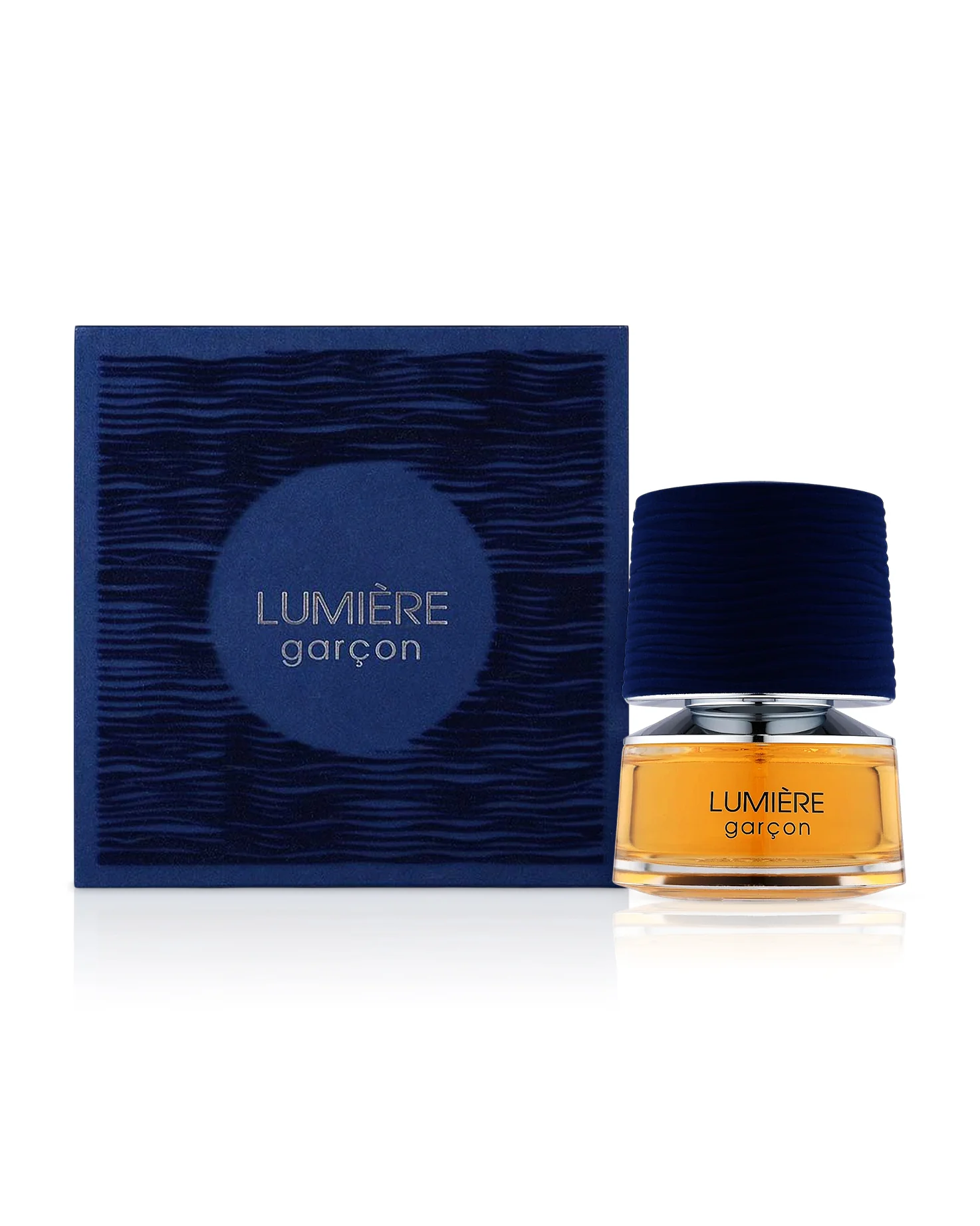 lumiere-gracon-perfume-bottle-beside-box-against-white-background Lumière Garçon 100 ml لوميار قرسون - Image 1
